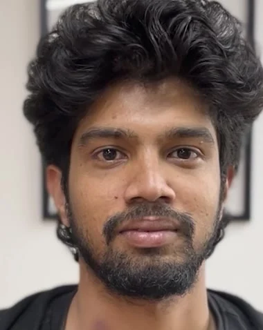 A printed photograph of a face held up in front of the camera